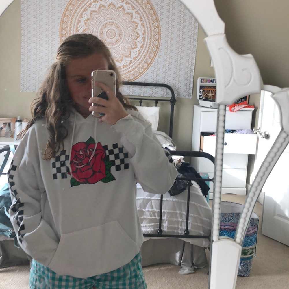 Checkered sweatshirt.